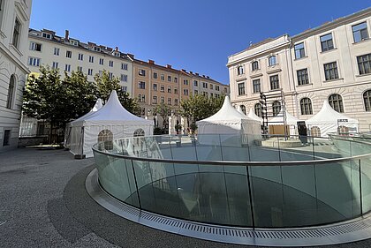 Tents are set up for an event at the Joanneumsviertelplatz.
