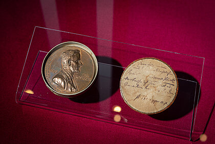 Commemorative coin with portrait of Rosegger in case