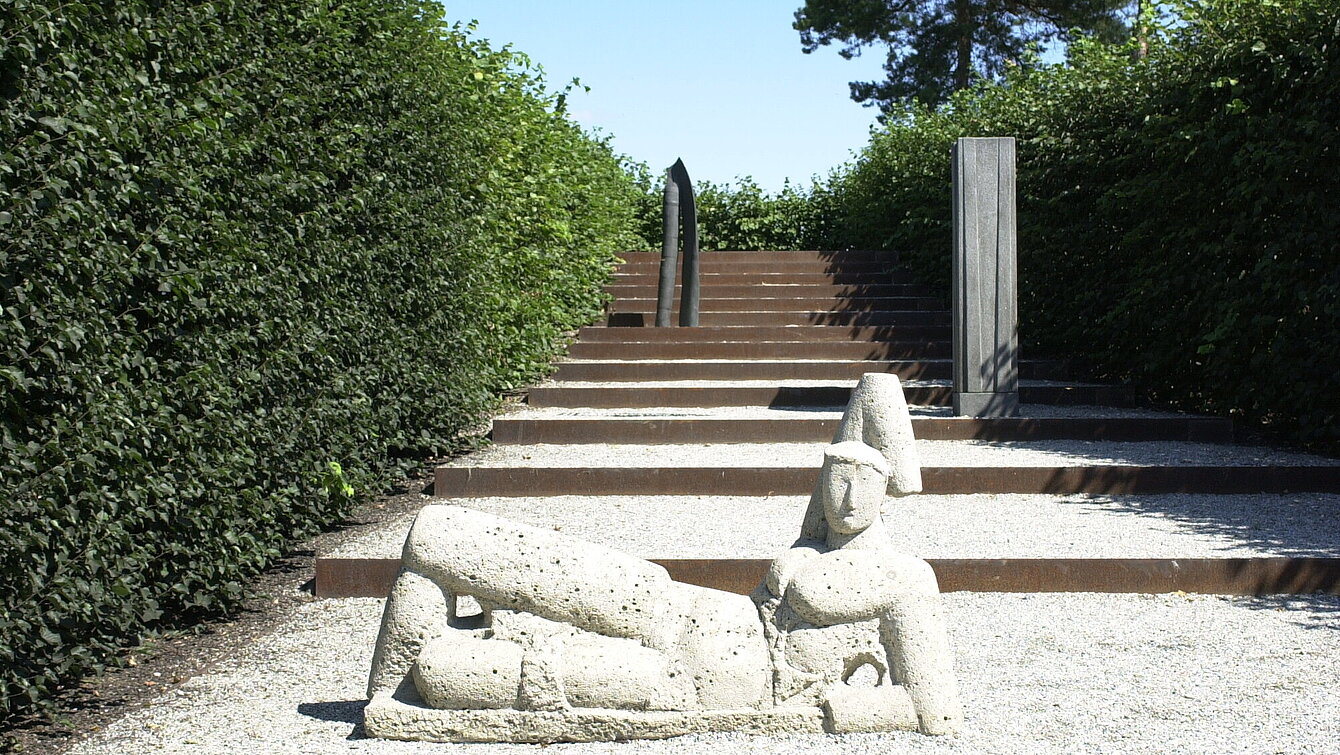 The stone sculpture "Large dormant" at the foot of the stairway to heaven in the Pheasant Garden. 