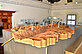 In one room there is a large model made of wood. The model shows the mountains and valleys of the Liezen region.